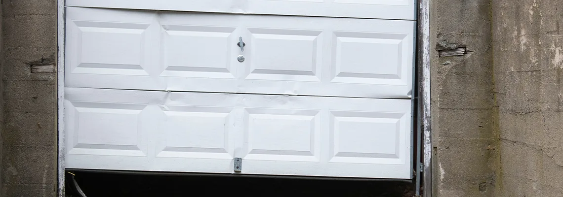 Garage Door Got Hit By A Car Dent Removal in Kankakee, IL